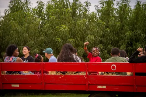 people on a hayride at the Pennsylvania Linvilla Orchards Apple Festival