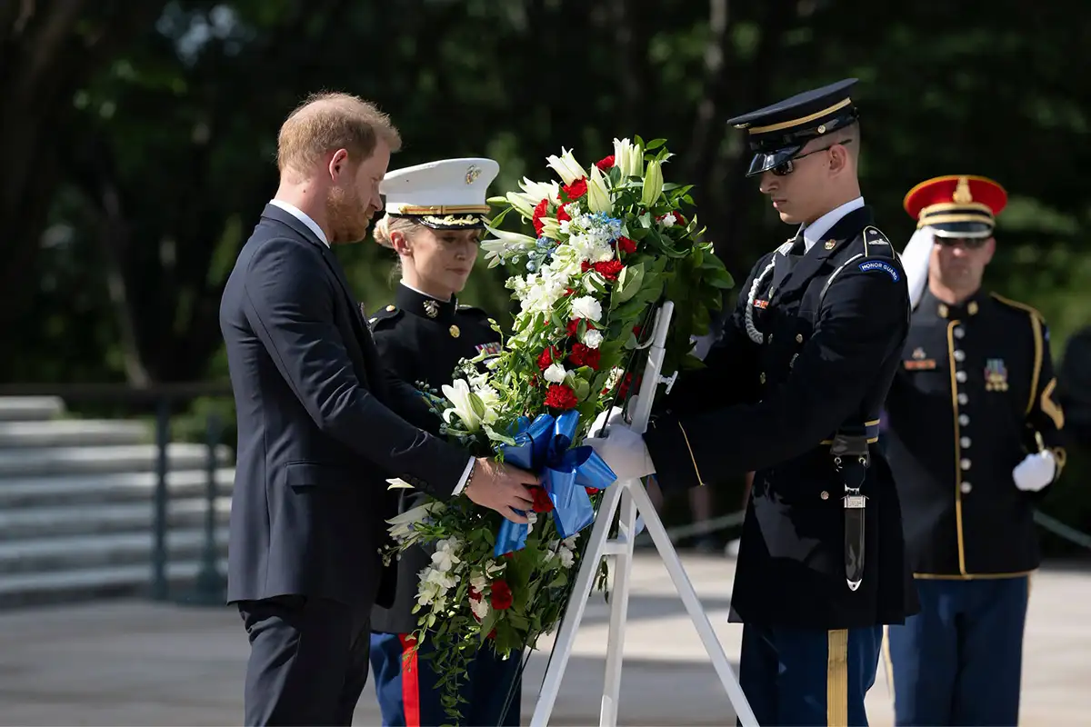Prince Harry participates in a public wreath-laying ceremony at the Tomb of the Unknown Soldier at Arlington National Cemetery
