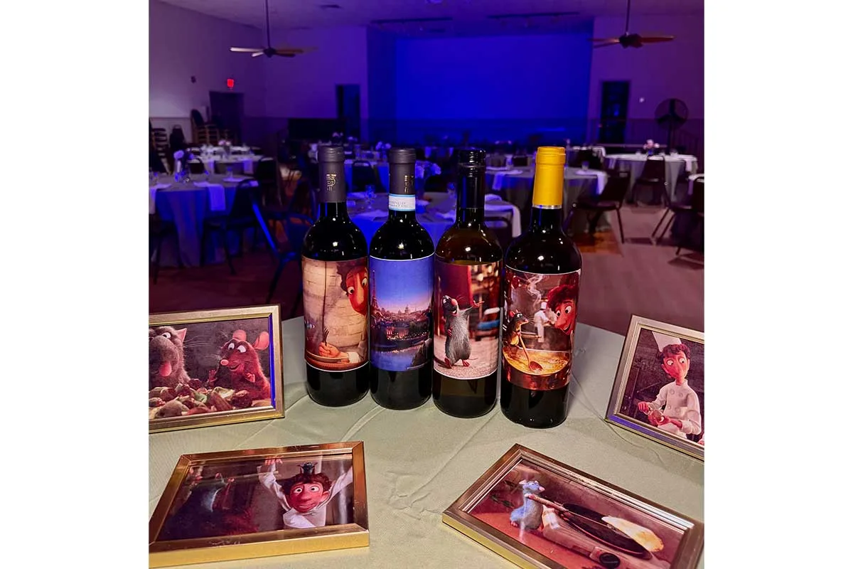 four wine bottles with pictures from Ratatouille film