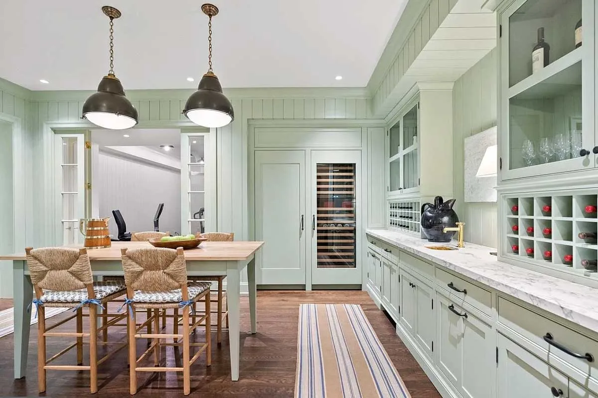 bar with sitting area and wine storage