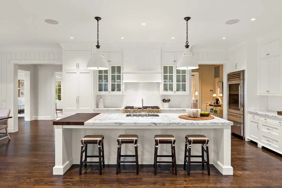 all-white kitchen with custom cabinets