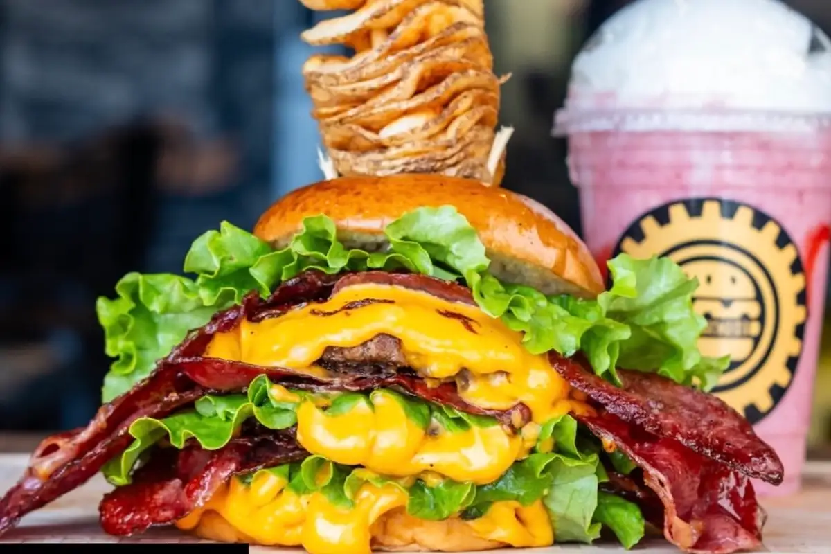a cheeseburger, potato wedges and milkshake from Burger Factory
