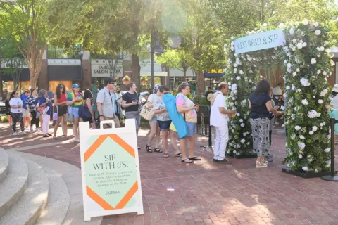 people line up at the Fairfax Corner Silent Read and Sip