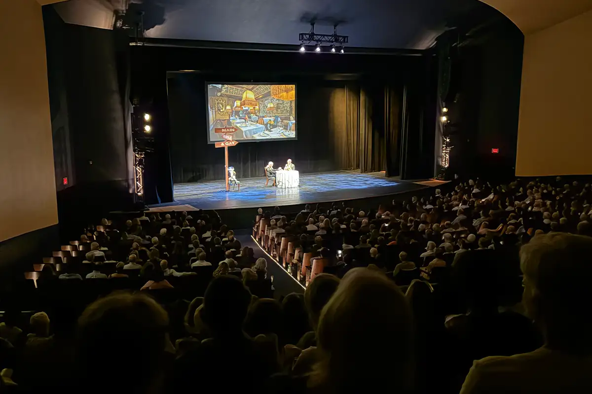 Chef Patrick O'Connell on stage at Lisner Auditorium discussing his new memoir, Main, Middle & Gay