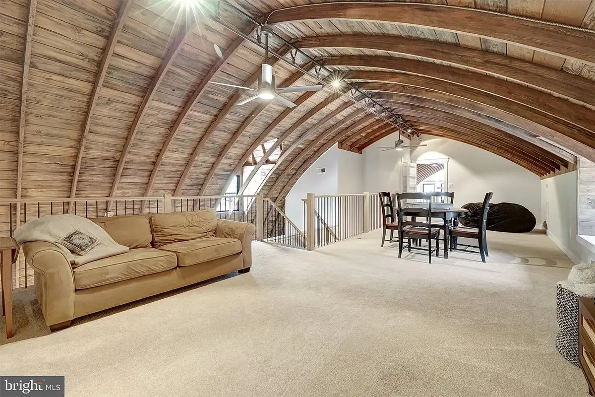 Loft with couch and dining table