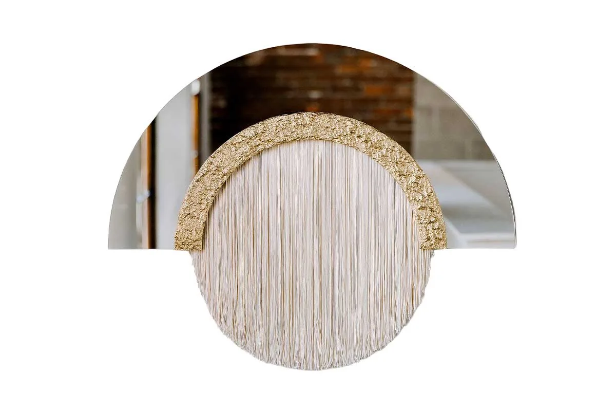 mirror with wood and fringe accents