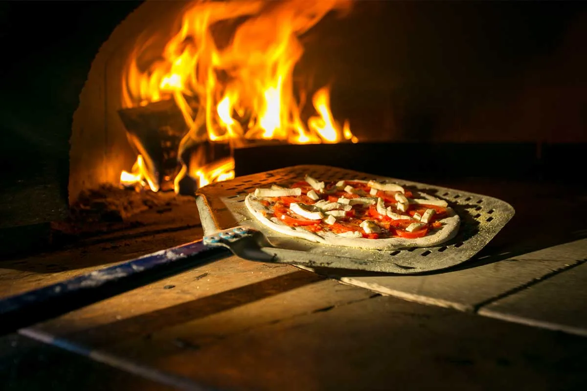 Pizza in oven at mountain state brewing co.