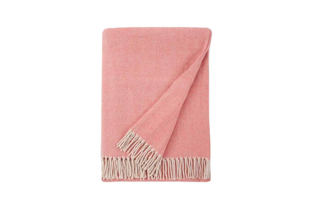 pink throw blanket with fringe ends