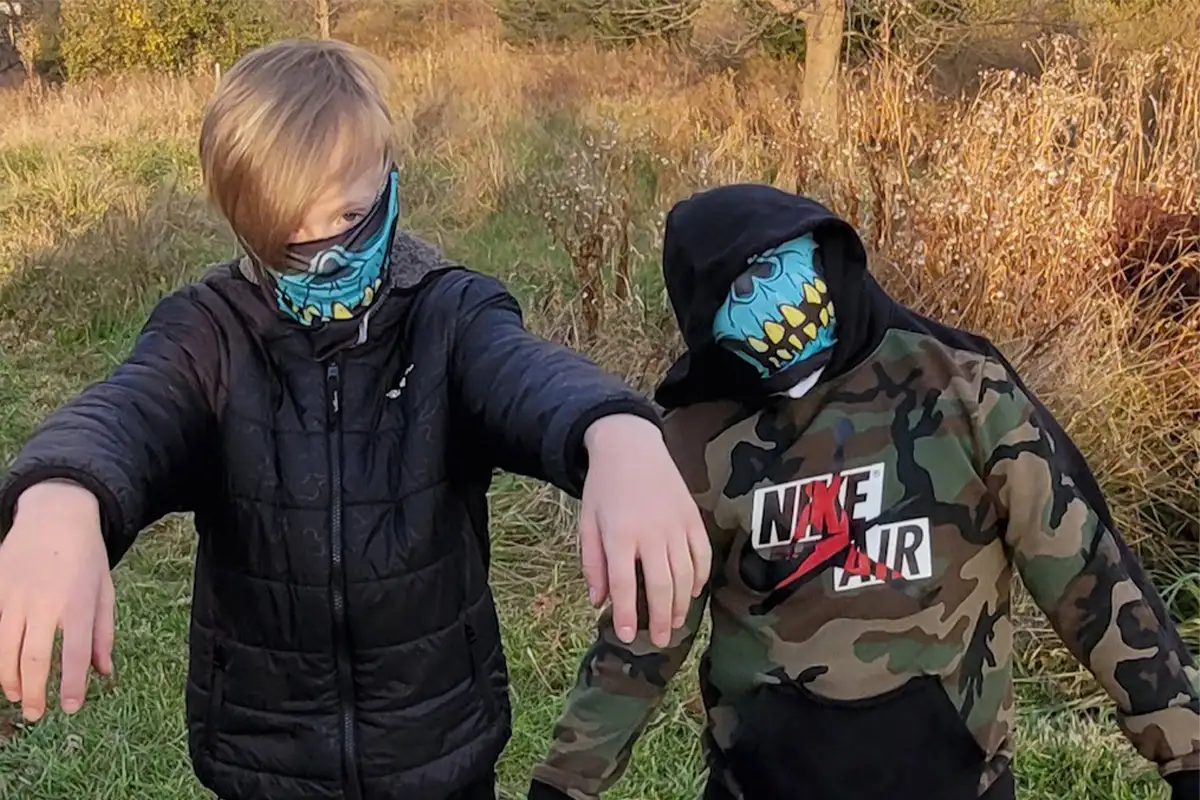 Two boys dressed as zombies
