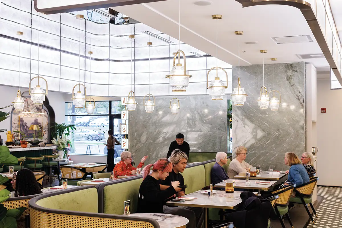people sitting at tables at 1983 Chinese cuisine