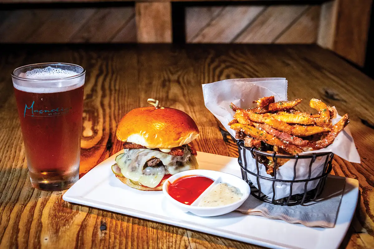 burger and fries at Magnolias at the Mill