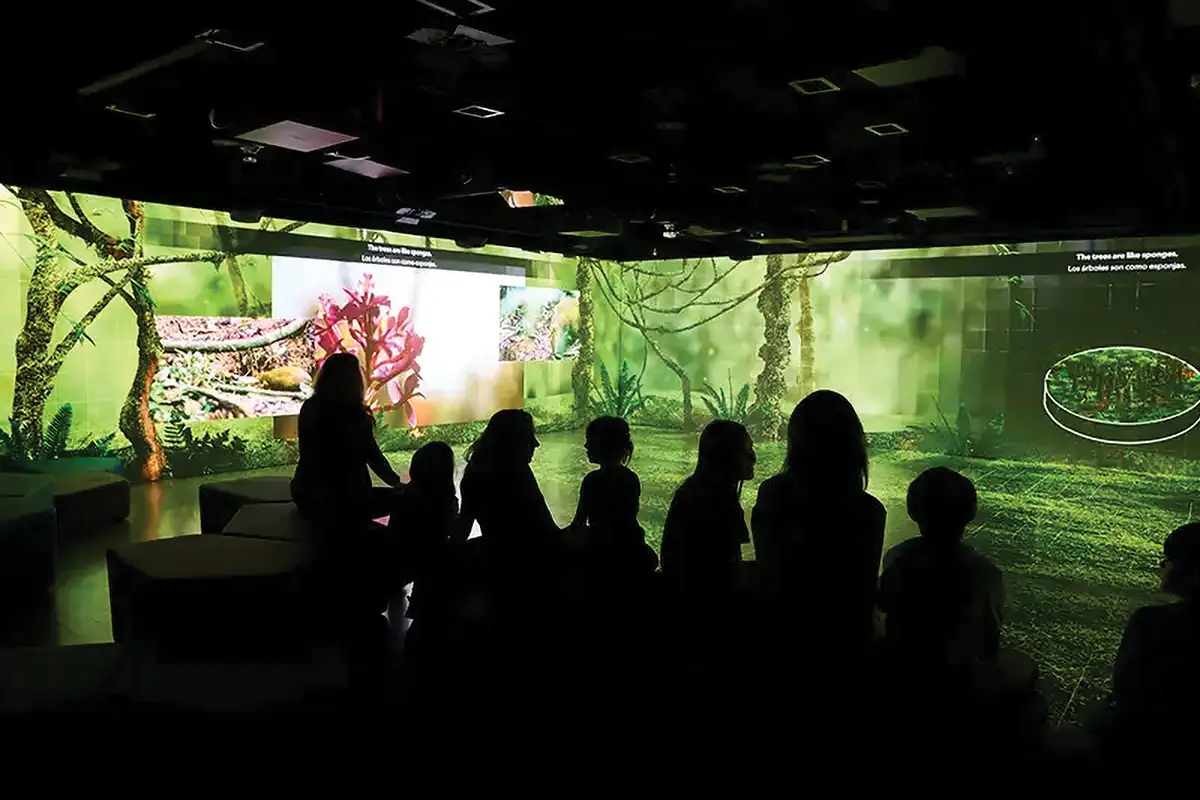 people stand outside of an exhibit at the National Geographic Museum of Exploration
