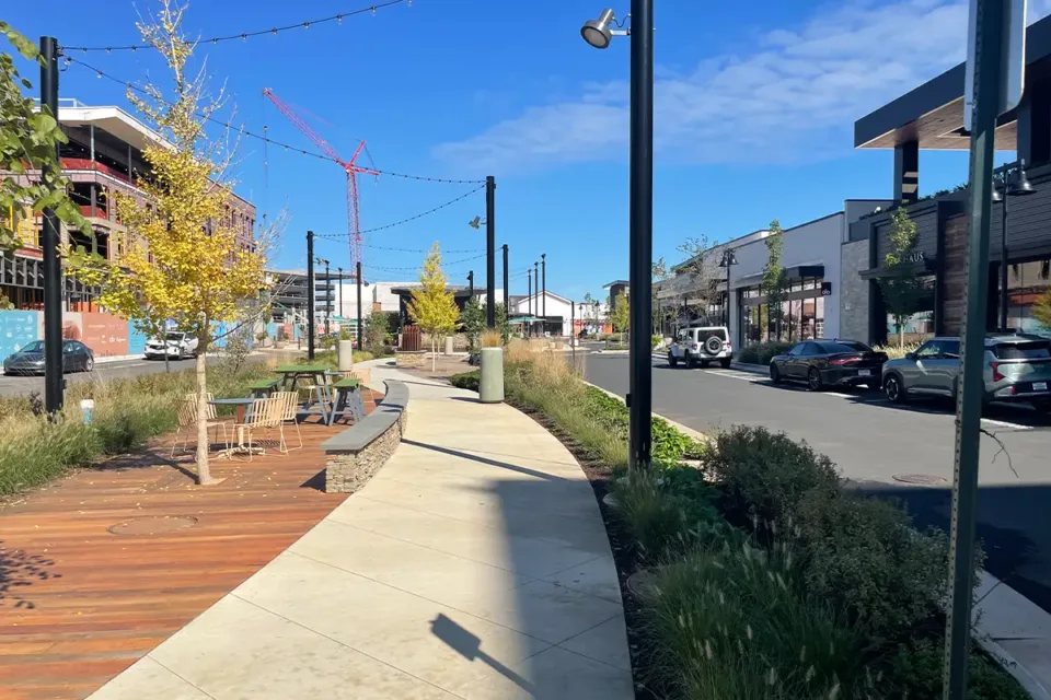 Photo of sidewalk in One Loudoun leading to the newly constructed shopping center