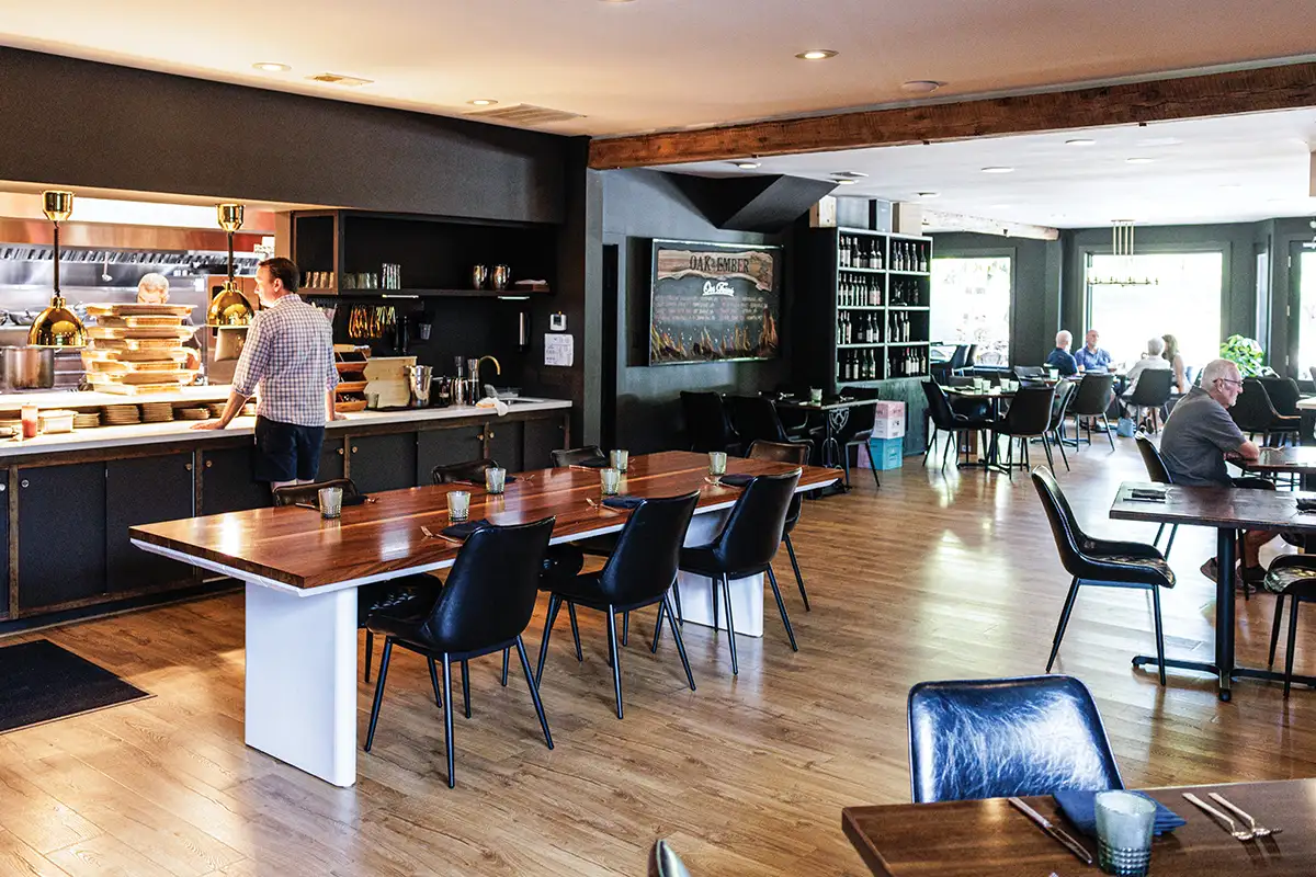 dining room and kitchen at Oak & Ember Tasting Room & Market
