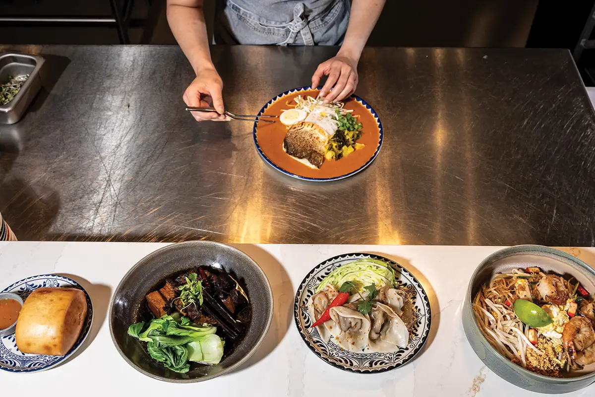 chef plating dish at sorn thai
