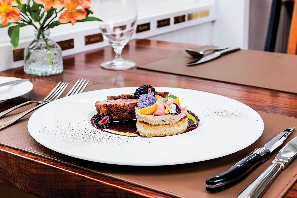 plated dish on dining table at the ashby inn