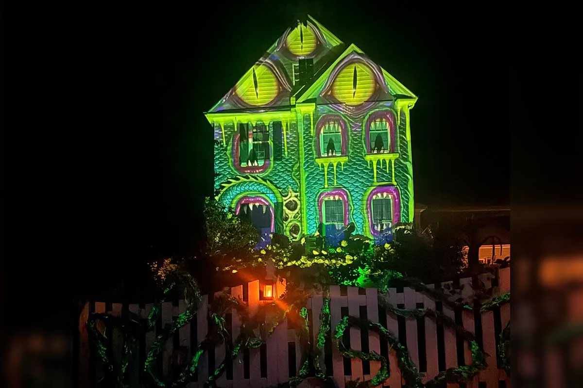 Poison garden-themed halloween display with monster project on home