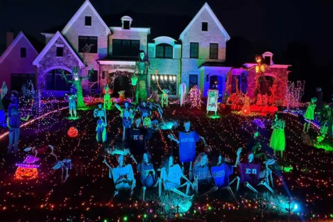 Middleburg home with skeletons and halloween-colored lights in yard